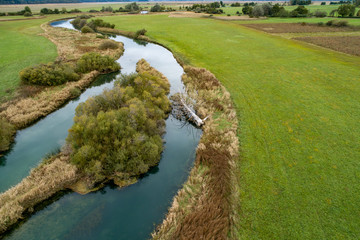 Wall Mural - Lake Cerknica (Slovene: Cerknisko Jezero, Cerkniško jezero ) is an intermittent lake on Cerknica Polje ( Cerknisko Polje ) an biggest karst phenomena in  Slovenia. During autumn at high waters.