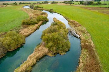 Wall Mural - Lake Cerknica (Slovene: Cerknisko Jezero, Cerkniško jezero ) is an intermittent lake on Cerknica Polje ( Cerknisko Polje ) an biggest karst phenomena in  Slovenia. During autumn at high waters.