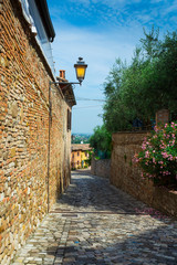 Fototapete -  Italian street in a small provincial town of Tuscan