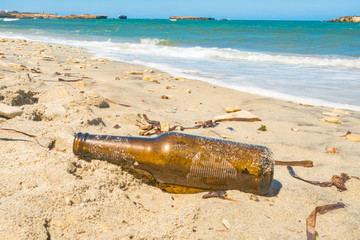 after party trash on the beach