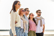 © Syda Productions - friendship, leisure and people concept - group of happy friends on beach in summer
