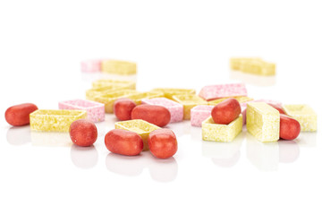 Lot of whole sweet pastel candy isolated on white background