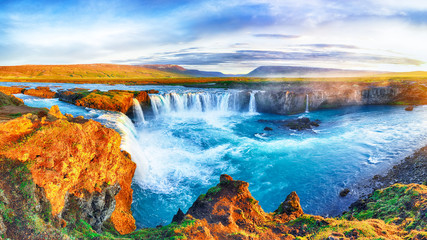 Wall Mural - fantastic sunrise scene of powerful godafoss waterfall.
