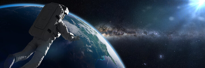 Wall Mural - astronaut in orbit of planet earth