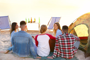 Wall Mural - Friends having picnic near river