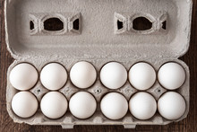 Close Up Of A Dozen Eggs In Cardboard Egg Carton, Food Background