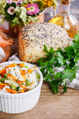 Sticker - Boiled rice with vegetables in a white ribbed bowl.