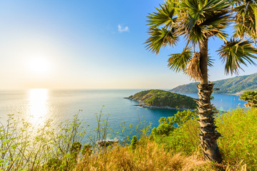 Wall Mural - Phromthep cape viewpoint at sunset in Phuket, beautiful coast scenery on tropical island with paradise beaches, Thailand