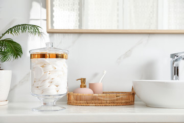 Wall Mural - Jar with cotton pads on bathroom countertop