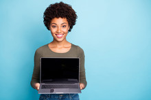 Photo Of Cheerful Charming Nice Cute Black Woman Demonstrating You New Line Of Laptops With Sales At Once Smiling Toothily Isolated Over Vivid Color Blue Background