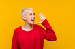 © luismolinero - Teenager girl with white short hair over yellow wall shouting with mouth wide open