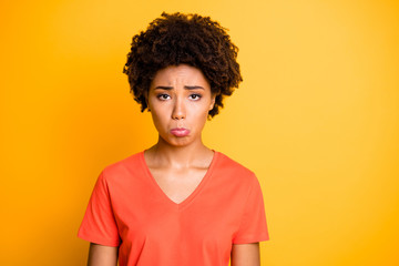 Poster - Photo of sullen dark skin lady offended after boyfriend rude behavior wear orange v neck t-shirt isolated yellow color background