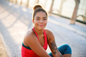 Wall Mural - Dark-eyed beautiful woman feeling amazing after yoga