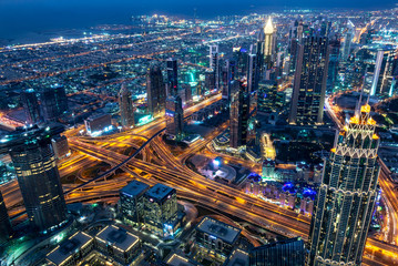 Wall Mural - Aerial view of Dubai at night seen from Burj Khalifa tower, United Arab Emirates
