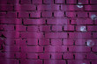 Fuchsia brick wall with bubbles texture background. Abstract street art close up