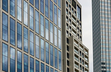 Abstract Image Of The Glass Front Of A Skyscraper With A Strict Right-angled Geometric Pattern