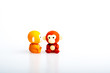 Two monkey rubber toys, cute animal shaped rubber doll isolated in white background. Toys for children.
