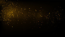 Glowing Golden Particles On Black Background