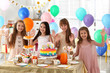 © New Africa - Happy children at birthday party in decorated room