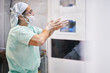 © Per Swantesson/Stocksy - Nurse is cleaning her hands before surgery