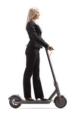 Sticker - Woman in formal clothes riding an electric scooter to work