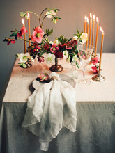 Candles And Flowers On Table