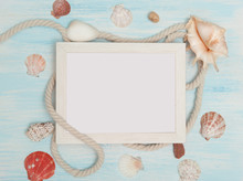 Sea Background With Frame And Blue Painted Wood, Rope, Starfish, Shells