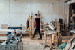 © Brat Co./Stocksy - Carpenter in Workshop
