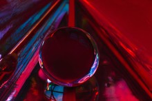 Stylish Texture With Magic Crystal Ball On Dark Red Colorful Background