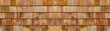 Old brown rustic light bright wooden shingle wall  texture - wood background panorama banner long pattern