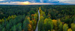 Latvian autumn nature. Forest and road. View from the top.