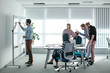 © Lumina/Stocksy - Businesspeople Having a Meeting