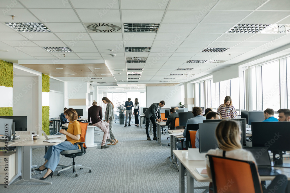 Businesspeople Working at Open Space Office Stock Photo | Adobe Stock