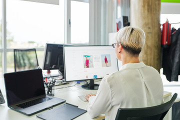 Adult woman working on computer