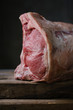 © Alberto Bogo/Stocksy - Piece of pork meat on board