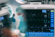 © MyMicrostock/Stocksy - Medical monitor showing the patient's status while surgeons works