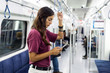 © Bisual Studio/Stocksy - Woman on the subway