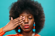 © Marc Bordons/Stocksy - Young afro hairstyle woman.