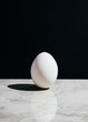 © Carmen Mart?nez Palma/Stocksy - White egg