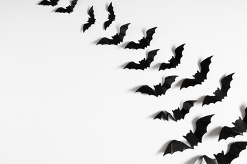 Wall Mural - Halloween decorations concept. Halloween with black bats on white background. Flat lay, top view, copy space