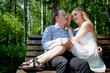 © keleny - Young man and woman couple walk in the park. Spring or summer love story. Young happy family