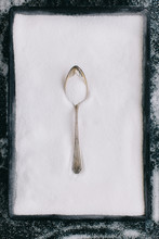 Old Fashioned Silver Spoon On Sugar