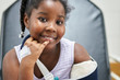 © Per Swantesson/Stocksy - Cute black girl in a hospital with broken arm