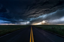 Heavy Storm And Heavy Cloudy Sky Over Road And Farm Fields