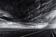 Heavy Storm And Cloud Sky Over Road And Farm Fields, Black And White