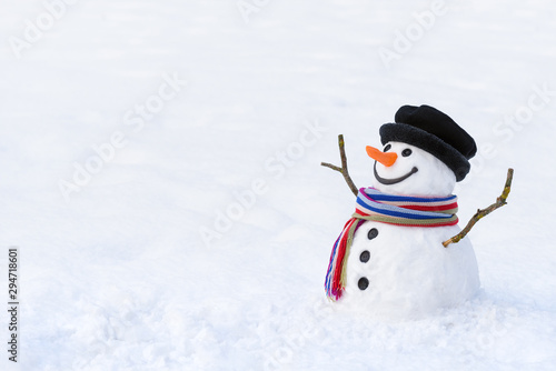 Cuadros en Lienzo Cute snowman in deep snow