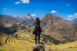 Tourist contemplating the landscape of the Sacred Valley in Pisac, Peru