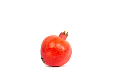 Pomegranate fruit on white background. The concept of eating fruit, eating meals with vitamins. Taking care of yourself, diet. Eating exotic fruits.