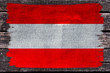 national flag of Austria on delicate silk with wind folds, travel concept, immigration, jeans texture