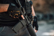 Private security concepts. Close-up image of a man with rifle.